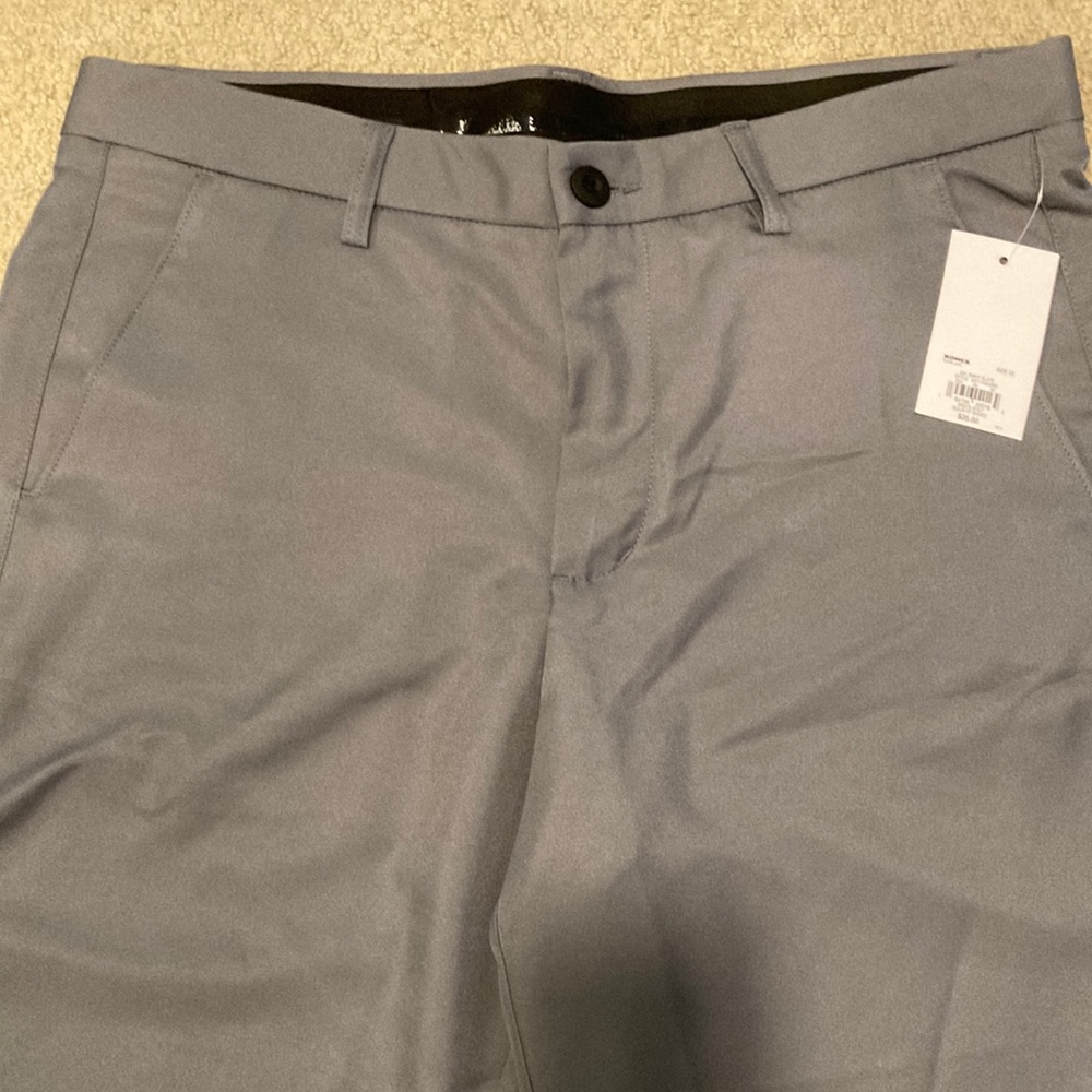 Grey flat front shorts- thin “tech” material. Perfect for golf ⛳️ New with tags